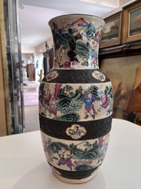 A pair of fine Chinese Nanking crackle glazed famille rose 'warrior' vases, 19th C.