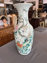 A Chinese famille rose vase with a pheasant and butterflies among blossoming branches, 19th C.