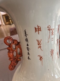 A Chinese qianjiang cai double design vase with an audience and a bird among blossoming branches, 19th/20th C.