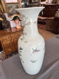 A Chinese famille rose vase with a pheasant and butterflies among blossoming branches, 19th C.