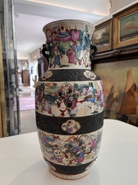 A pair of fine Chinese Nanking crackle glazed famille rose 'warrior' vases, 19th C.