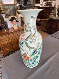 A Chinese famille rose vase with a pheasant and butterflies among blossoming branches, 19th C.