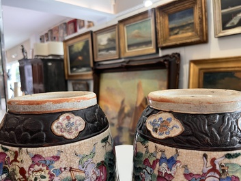 A pair of fine Chinese Nanking crackle glazed famille rose 'warrior' vases, 19th C.