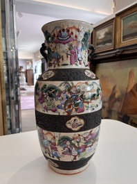 A pair of fine Chinese Nanking crackle glazed famille rose 'warrior' vases, 19th C.