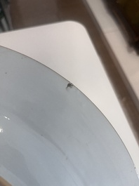 A Chinese blue and white dish with an animated river landscape, Qianlong