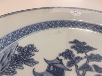 A Chinese blue and white dish with an animated river landscape, Qianlong