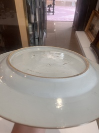 A Chinese blue and white dish with an animated river landscape, Qianlong