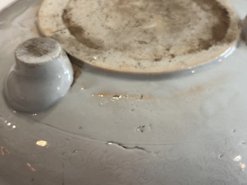 A Chinese monochrome white tripod censer with underglaze design, 19th C.
