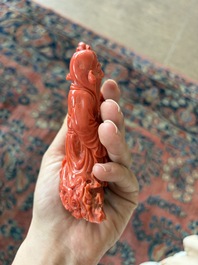 A Chinese red coral group with the 'Star God' Shou Xing and a lady, 19th/20th C.