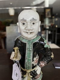 A Chinese famille noire 'soldier' figure, Kangxi