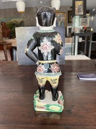 A Chinese famille noire 'soldier' figure, Kangxi