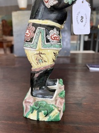 A Chinese famille noire 'soldier' figure, Kangxi