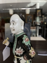 A Chinese famille noire 'soldier' figure, Kangxi