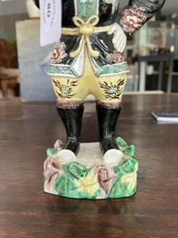 A Chinese famille noire 'soldier' figure, Kangxi