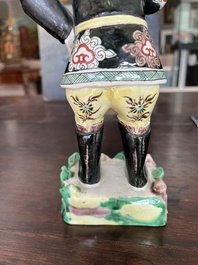 A Chinese famille noire 'soldier' figure, Kangxi