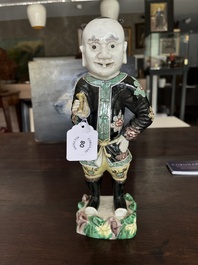 A Chinese famille noire 'soldier' figure, Kangxi