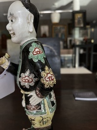 A Chinese famille noire 'soldier' figure, Kangxi