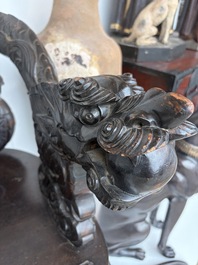 A pair of Japanese carved wooden 'dragon' chairs, Meiji, 19th/20th C.