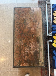 A Chinese rectangular carved and lacquered wooden low table with peach design, Qing