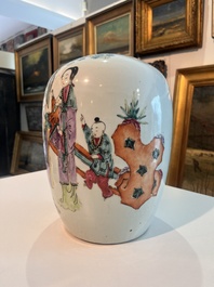 A pair of Chinese qianjiang cai jars and covers with ladies and children in a palace garden, 19th/20th C.