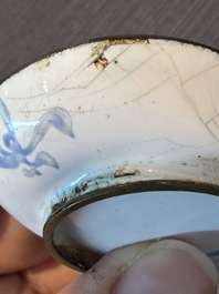 A Chinese Canton enamel bowl and cover, a patipan and a saucer with figures in a landscape, 19th C.