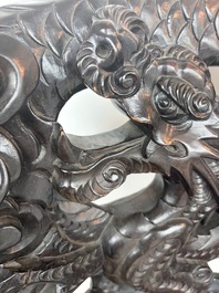 A pair of Japanese carved wooden 'dragon' chairs, Meiji, 19th/20th C.