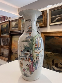 Two Chinese famille rose vases with ladies and children in a palace garden, 19th/20th C.