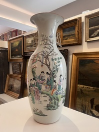 Two Chinese famille rose vases with ladies and children in a palace garden, 19th/20th C.