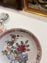 Six Chinese famille rose and gilt cups and saucers and a cream jug with floral and mandarin design, Yongzheng/Qianlong
