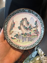 A Chinese Canton enamel bowl and cover, a patipan and a saucer with figures in a landscape, 19th C.