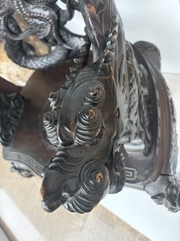 A pair of Japanese carved wooden 'dragon' chairs, Meiji, 19th/20th C.