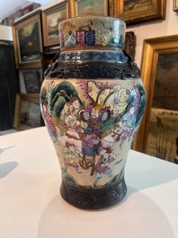 A Chinese Nanking crackle glazed famille rose 'warrior' vase and cover, a tea caddy and an Imari style teapot and cover, 18th/19th C.
