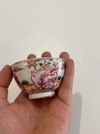 Six Chinese famille rose and gilt cups and saucers and a cream jug with floral and mandarin design, Yongzheng/Qianlong