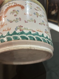 A Chinese famille rose 'dragon and phoenix' scroll pot, 19th C.