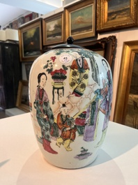 A pair of Chinese qianjiang cai jars and covers with ladies and children in a palace garden, 19th/20th C.