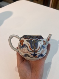 A Chinese Nanking crackle glazed famille rose 'warrior' vase and cover, a tea caddy and an Imari style teapot and cover, 18th/19th C.