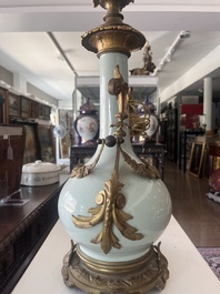 A Chinese style gilt bronze mounted celadon-glazed vase mounted into a lamp, 19th/20th C.