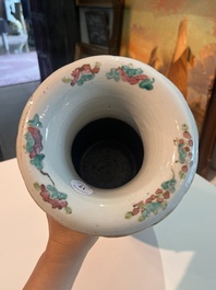 Three Chinese Canton famille rose 'warrior and palace scenes' vases, 19th C.