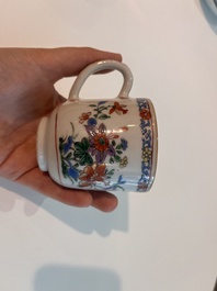 Two Chinese famille verte cups and saucers with floral design, Qianlong