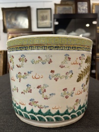 A Chinese famille rose 'dragon and phoenix' scroll pot, 19th C.