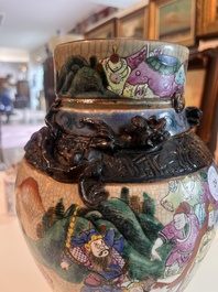 A Chinese Nanking crackle glazed famille rose 'warrior' vase and cover, a tea caddy and an Imari style teapot and cover, 18th/19th C.