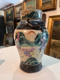 A Chinese Nanking crackle glazed famille rose 'warrior' vase and cover, a tea caddy and an Imari style teapot and cover, 18th/19th C.