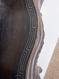 A pair of Japanese carved wooden 'dragon' chairs, Meiji, 19th/20th C.