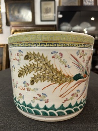 A Chinese famille rose 'dragon and phoenix' scroll pot, 19th C.