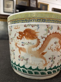 A Chinese famille rose 'dragon and phoenix' scroll pot, 19th C.