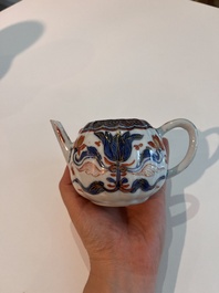 A Chinese Nanking crackle glazed famille rose 'warrior' vase and cover, a tea caddy and an Imari style teapot and cover, 18th/19th C.