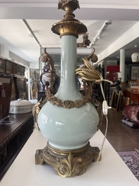 A Chinese style gilt bronze mounted celadon-glazed vase mounted into a lamp, 19th/20th C.