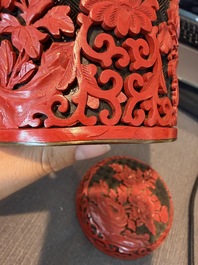 A varied collection of Chinese cloisonn&eacute; vases and boxes, two wooden figures and a carved cinnabar and black lacquer box and cover, 20th C.