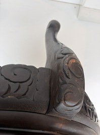 A pair of Japanese carved wooden 'dragon' chairs, Meiji, 19th/20th C.