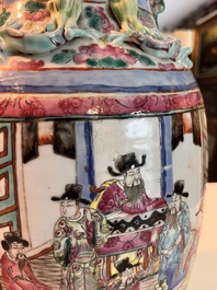 Three Chinese Canton famille rose 'warrior and palace scenes' vases, 19th C.